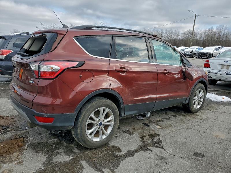 Photo 3 from auction – 2018 FORD ESCAPE SE with VIN 1FMCU9GD0JUC13244