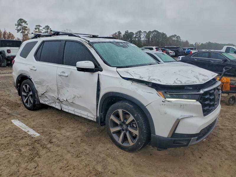 Photo 4 from auction – 2023 HONDA PILOT ELIT with VIN 5FNYG1H84PB025462