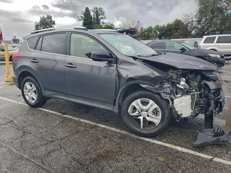 Photo 4 from auction – 2015 TOYOTA RAV4 LE with VIN JTMZFREV6FJ030587