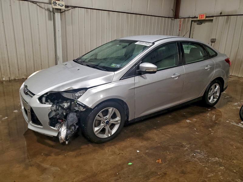 FORD FOCUS SE 2014 with VIN 1FADP3F20EL395591 - Photo from auction