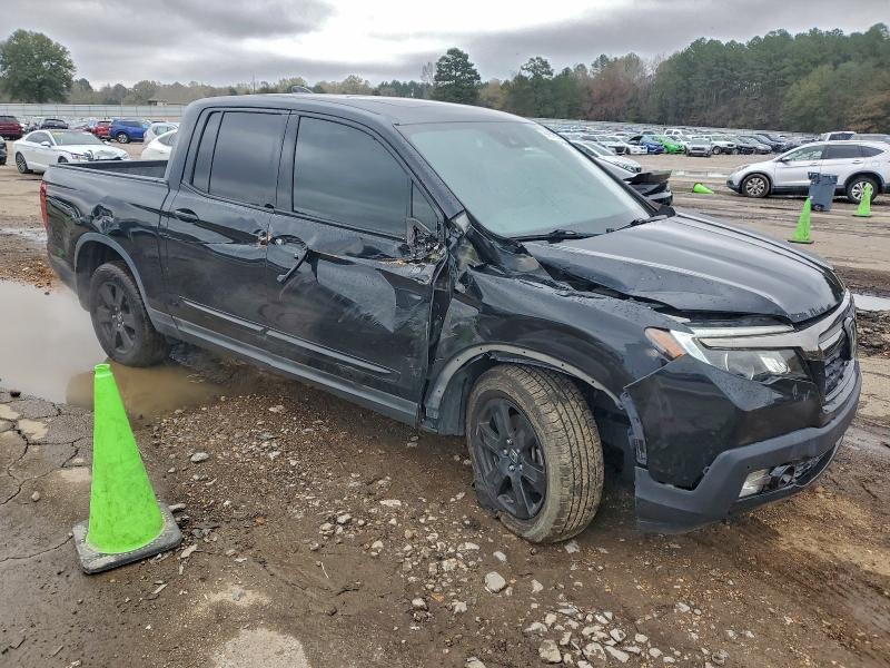 Photo 4 from auction – 2017 HONDA RIDGELINE with VIN 5FPYK3F86HB015280