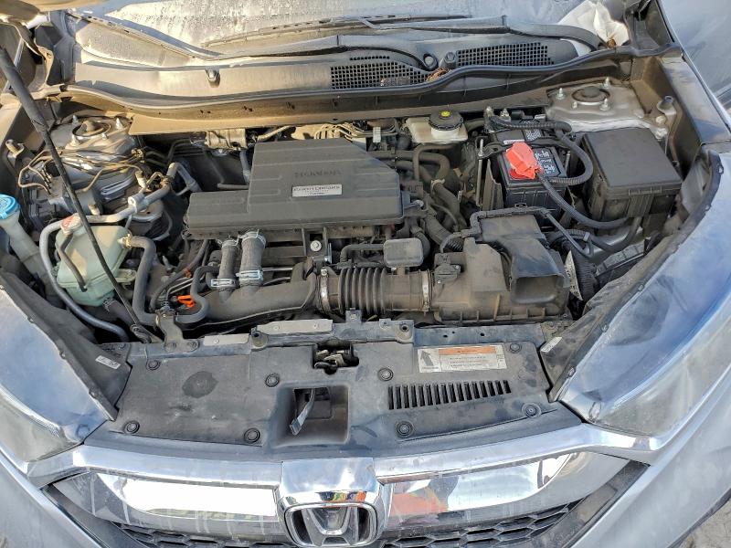 Photo 11 from auction – 2018 HONDA CR-V with VIN 7FARW1H88JE003287