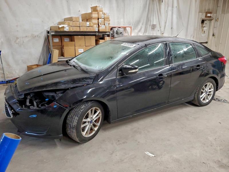 FORD FOCUS SE 2016 with VIN 1FADP3F21GL385123 - Photo from auction