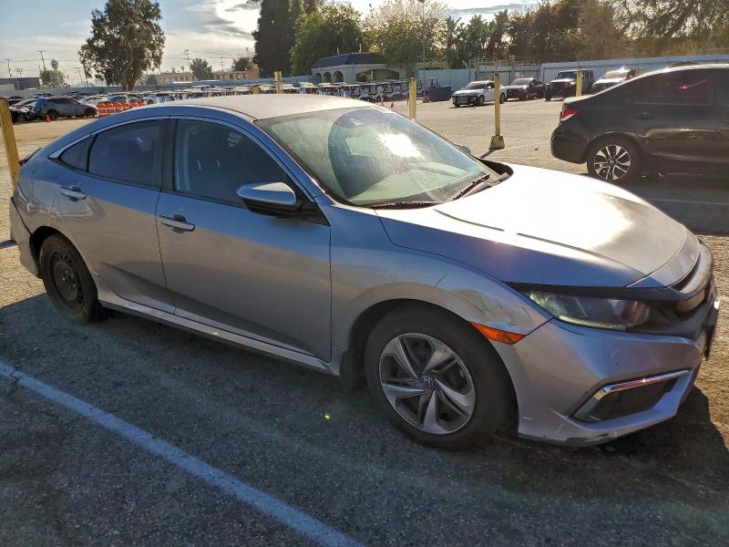 Photo 4 from auction – 2019 HONDA CIVIC LX with VIN 2HGFC2F67KH575592