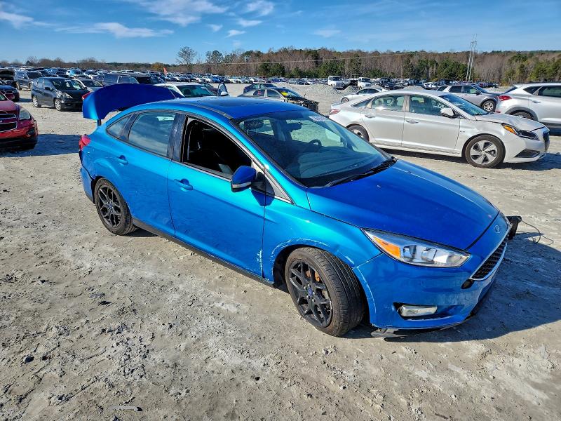 Photo 4 from auction – 2016 FORD FOCUS SE with VIN 1FADP3F21GL253320