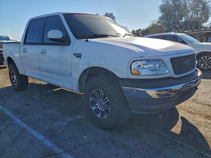 Photo 4 from auction – 2001 FORD F150 SUPER with VIN 1FTRW07W11KE03345
