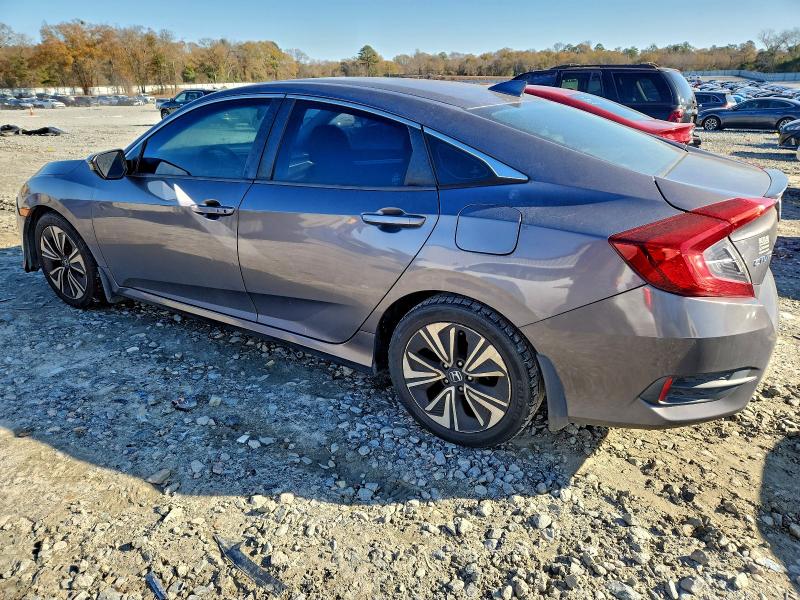 Photo 2 from auction – 2018 HONDA CIVIC EX with VIN 19XFC1F32JE002298