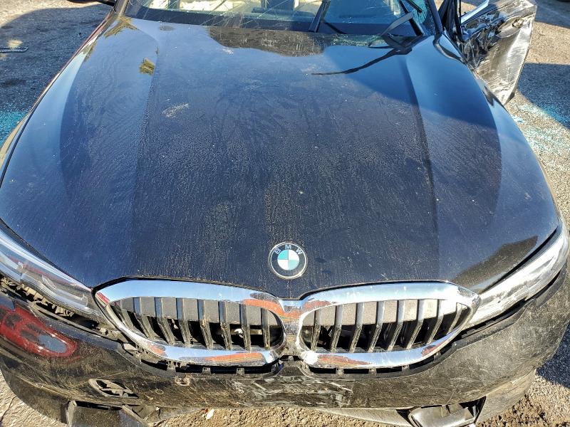 Photo 11 from auction – 2021 BMW 330I with VIN 3MW5R1J06M8C12555