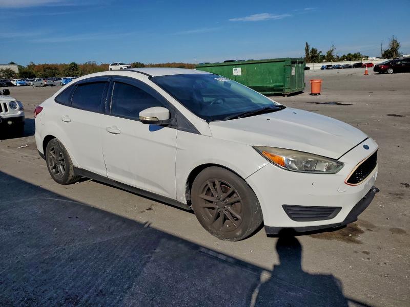 Photo 4 from auction – 2017 FORD FOCUS SE with VIN 1FADP3F28HL338401