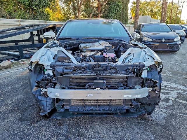 Photo 5 from auction – 2024 GENESIS G70 BASE with VIN KMTG34SC1RU139453