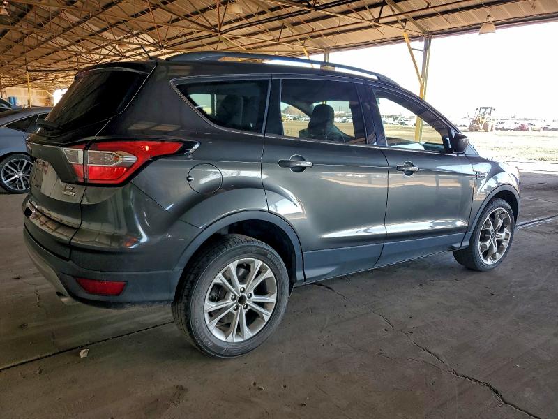 Photo 3 from auction – 2018 FORD ESCAPE SE with VIN 1FMCU0G95JUC63600