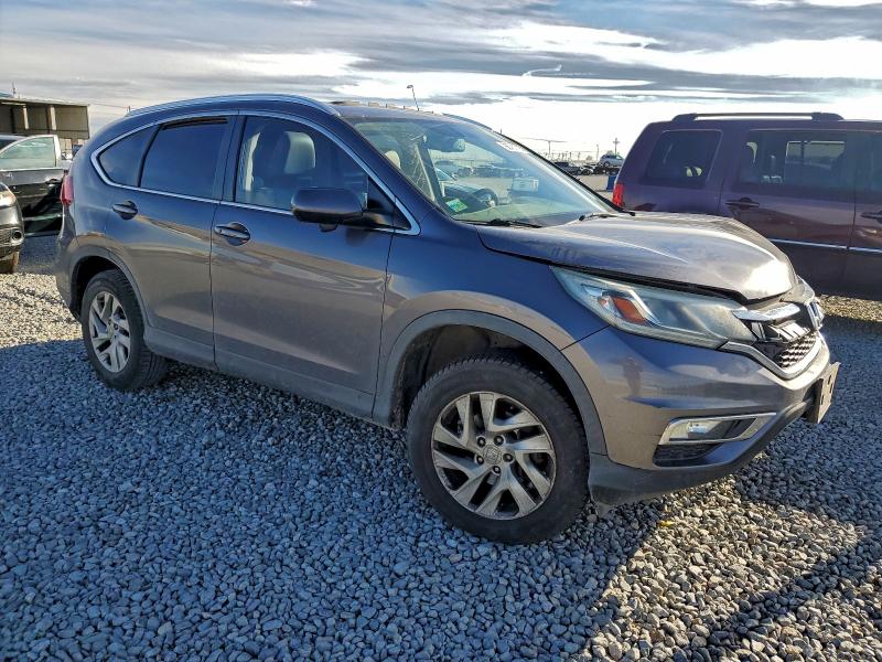 Photo 4 from auction – 2015 HONDA CR-V EXL with VIN 2HKRM4H76FH637569