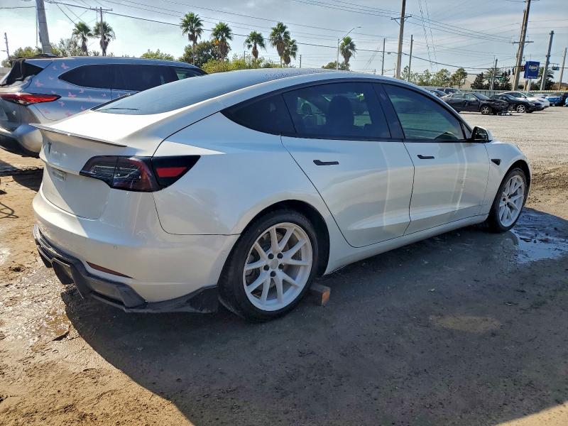 Photo 3 from auction – 2021 TESLA MODEL 3 with VIN 5YJ3E1EA0MF857898