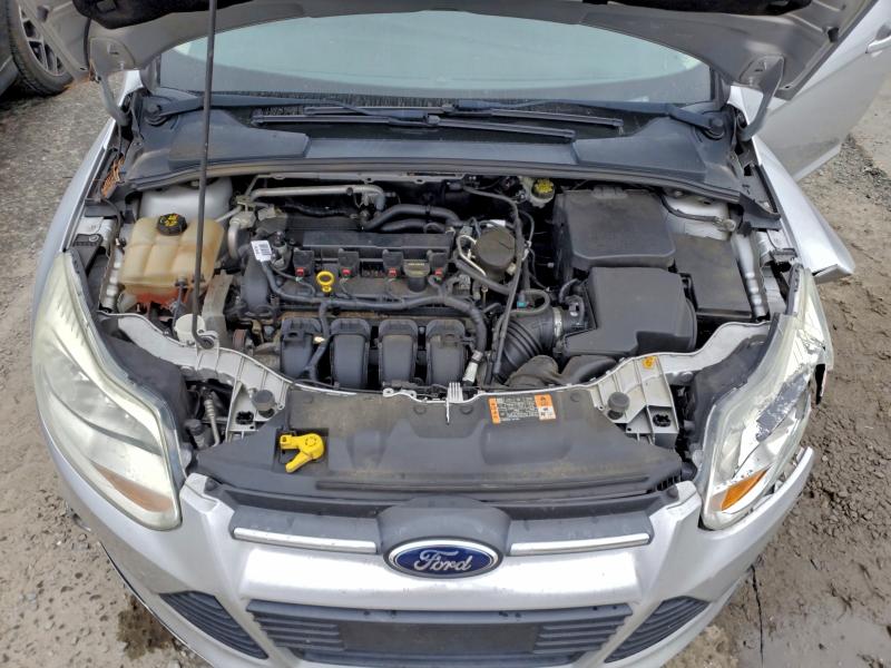 Photo 11 from auction – 2014 FORD FOCUS SE with VIN 1FADP3F26EL324511