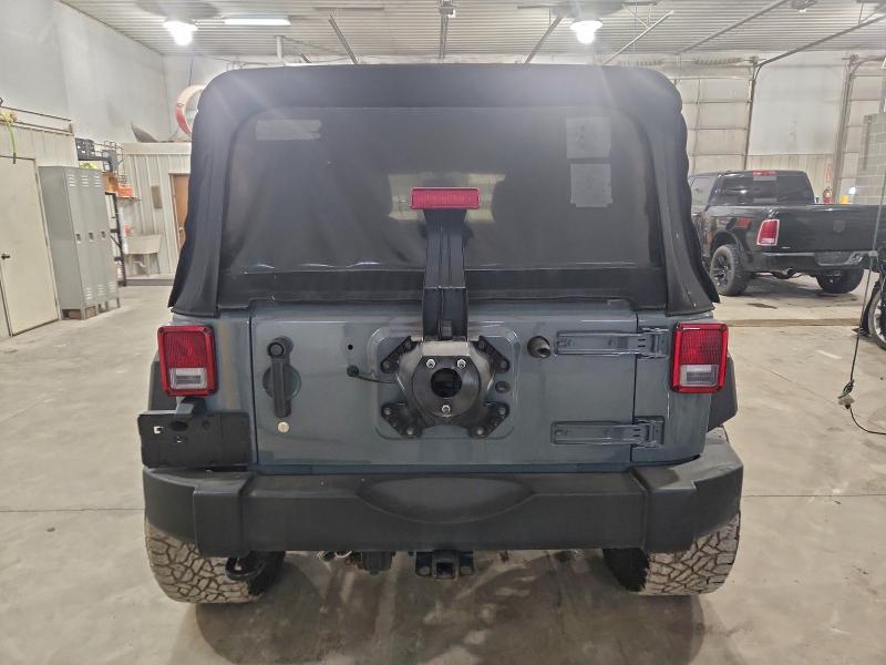 Photo 6 from auction – 2015 JEEP WRANGLER U with VIN 1C4BJWDG0FL614036