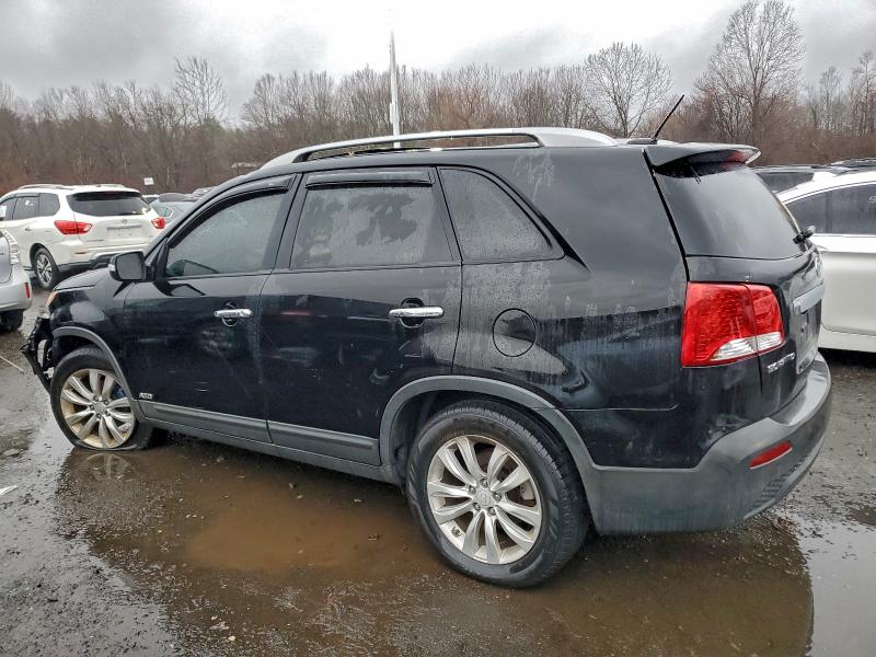 Photo 2 from auction – 2011 KIA SORENTO EX with VIN 5XYKUDA21BG125087