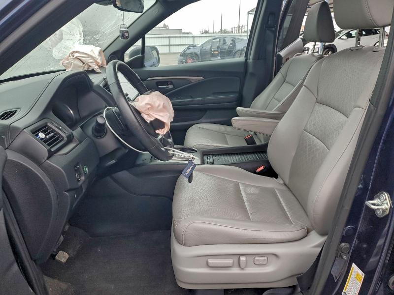 Photo 7 from auction – 2020 HONDA PASSPORT E with VIN 5FNYF7H54LB001233