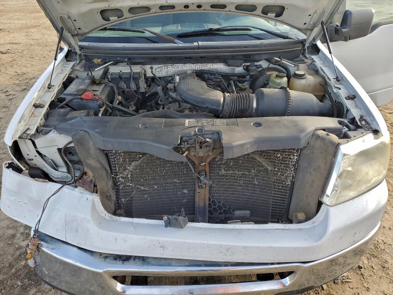 Photo 11 from auction – 2006 FORD F150 with VIN 1FTRX12W96KC15772