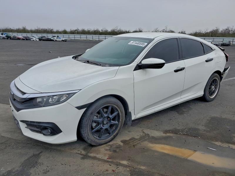 HONDA CIVIC 2018 with VIN 2HGFC2E55JH582273 - Photo from auction