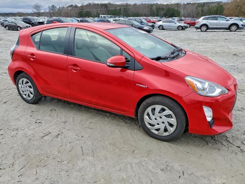 Photo 4 from auction – 2015 TOYOTA PRIUS C with VIN JTDKDTB3XF1104293