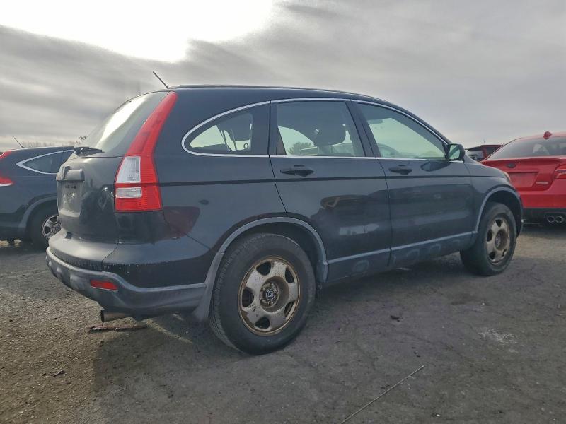 Photo 3 from auction – 2007 HONDA CR-V LX with VIN JHLRE48367C028668