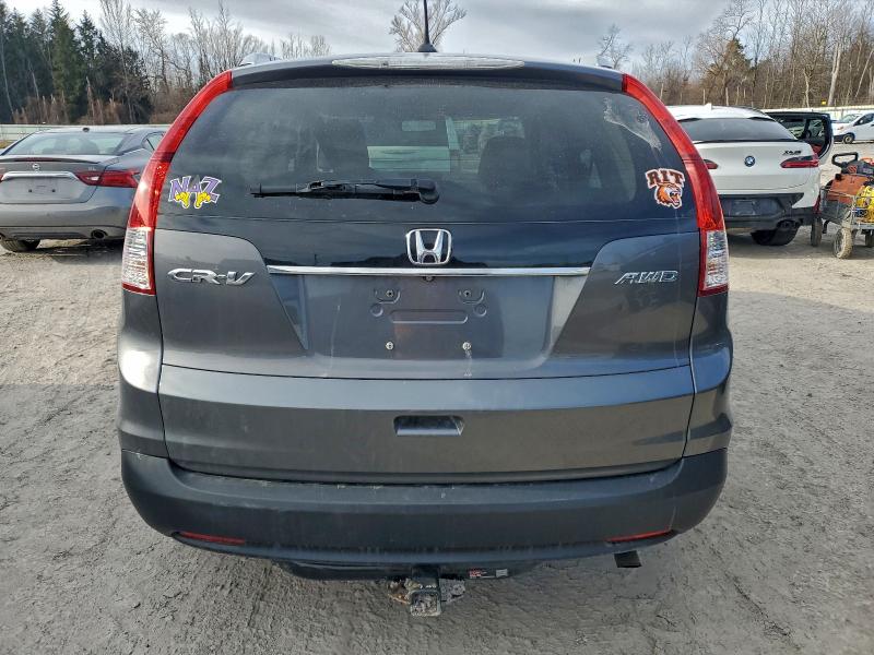 Photo 6 from auction – 2013 HONDA CR-V EXL with VIN 2HKRM4H77DH690097