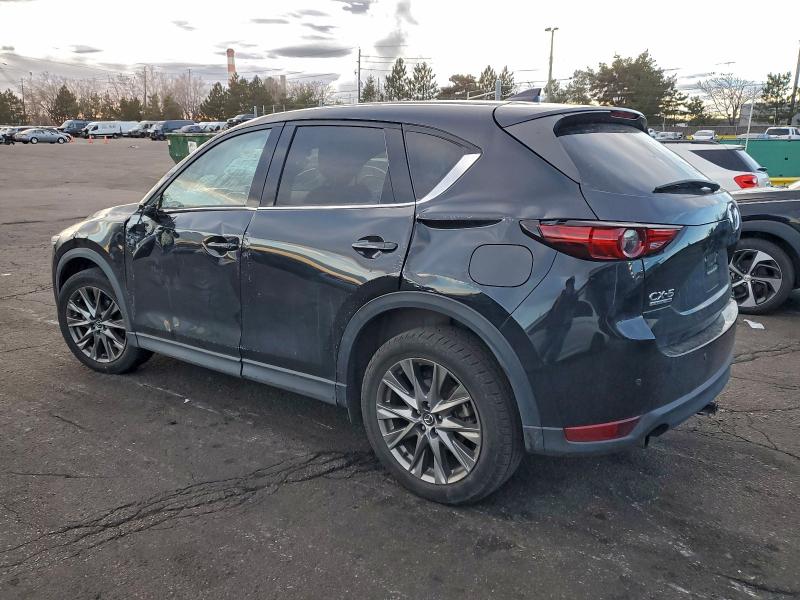 Photo 2 from auction – 2021 MAZDA CX-5 SIGNA with VIN JM3KFBEY1M0325934