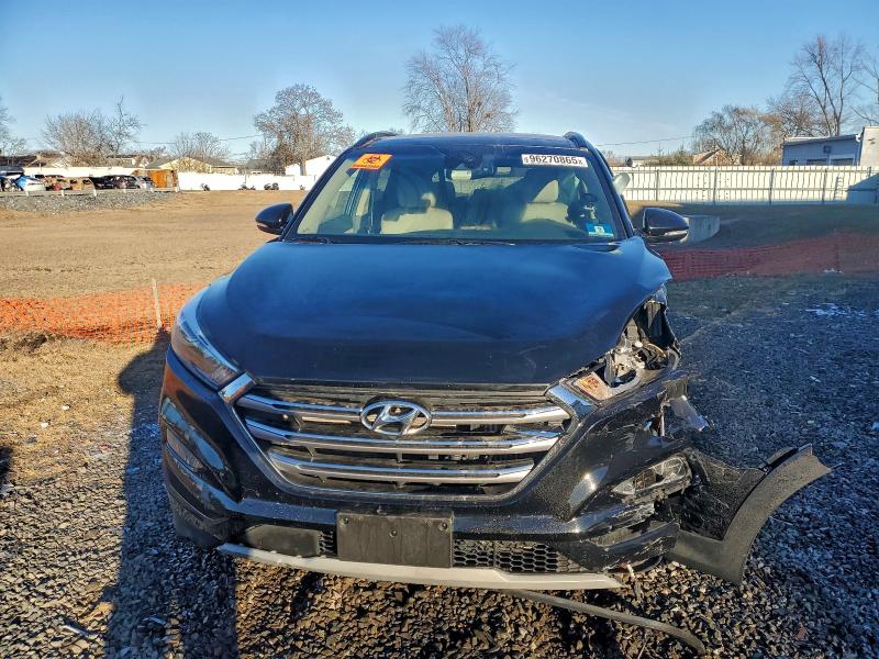 Photo 5 from auction – 2018 HYUNDAI TUCSON VAL with VIN KM8J3CA27JU612067