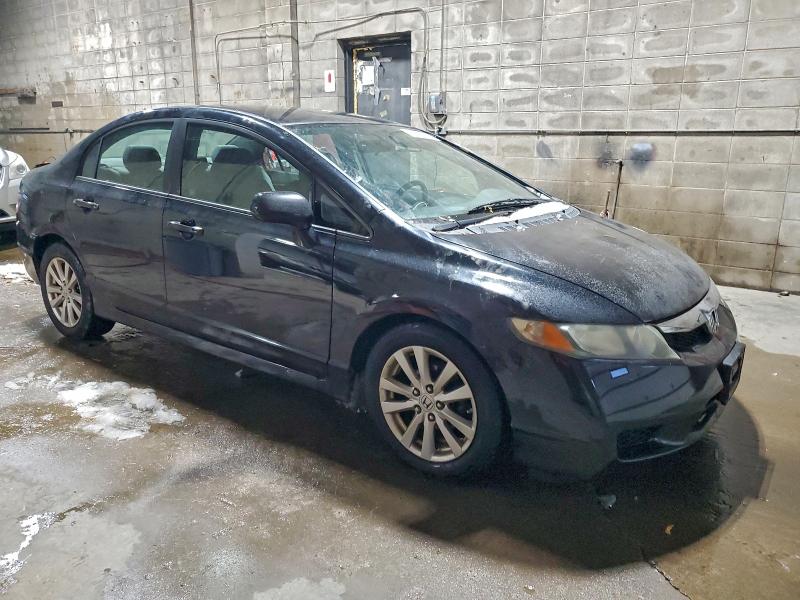 Photo 4 from auction – 2011 HONDA CIVIC LX with VIN 19XFA1F54BE040043