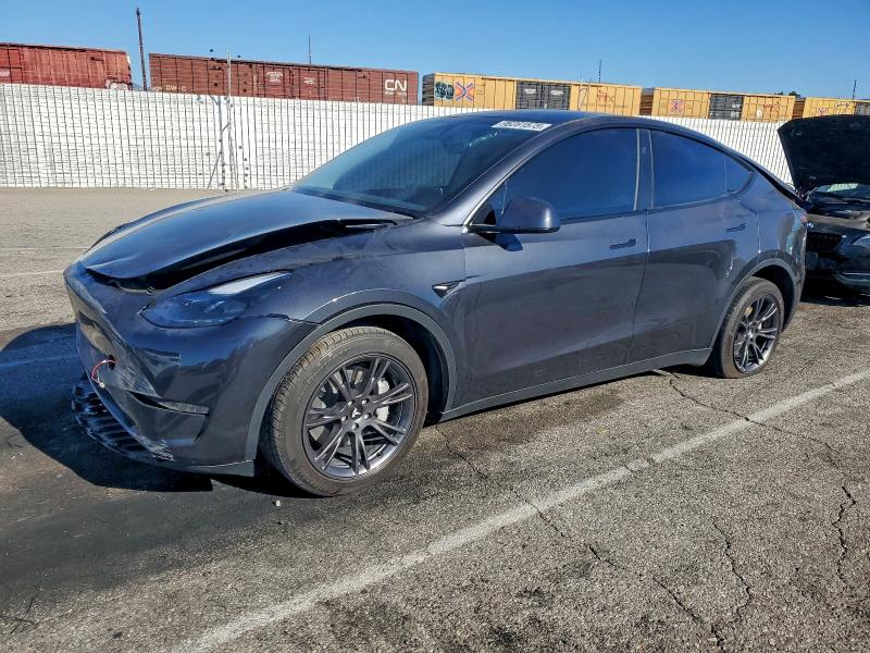 TESLA MODEL Y 2024 with VIN 7SAYGDED4RF197435 - Photo from auction