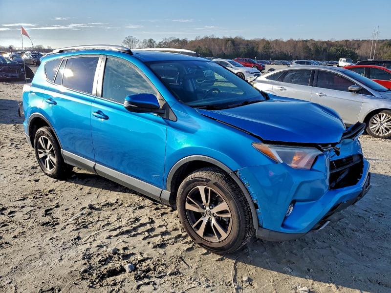 Photo 4 from auction – 2016 TOYOTA RAV4 XLE with VIN JTMRFREV5GD177497