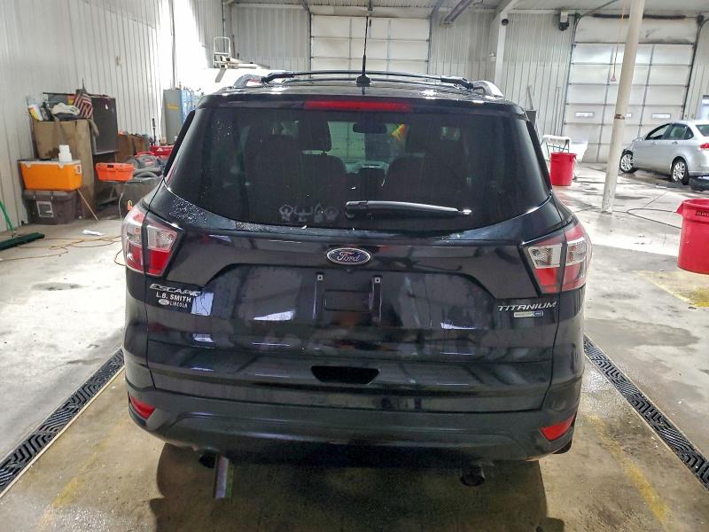 Photo 6 from auction – 2017 FORD ESCAPE TIT with VIN 1FMCU9J94HUD03432
