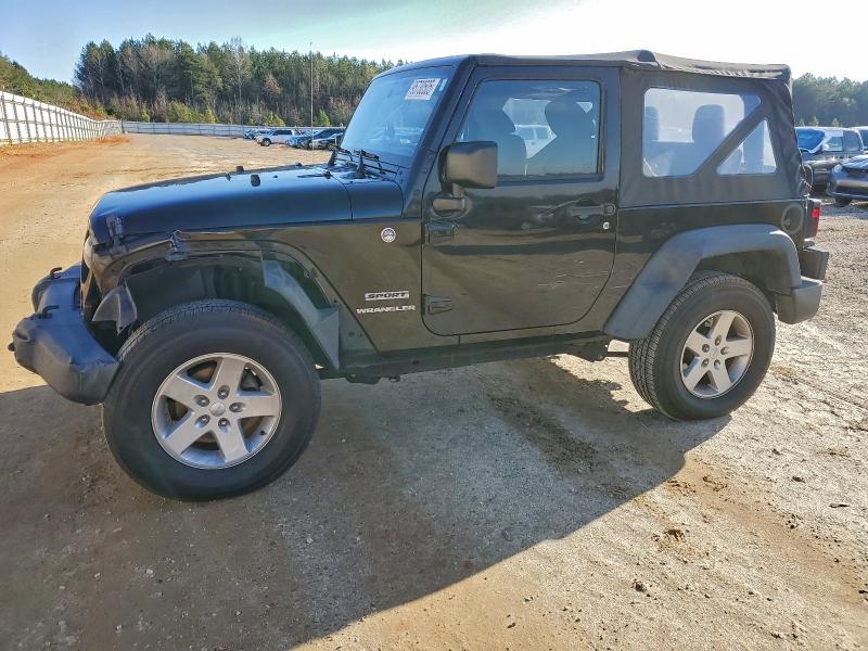 JEEP WRANGLER S 2015 with VIN 1C4AJWAG2FL549903 - Photo from auction