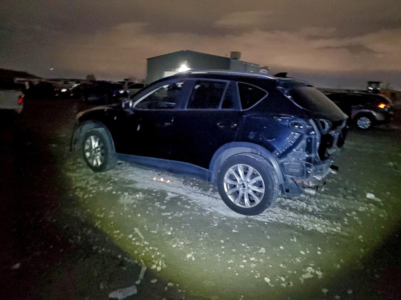 Photo 2 from auction – 2014 MAZDA CX-5 GT with VIN JM3KE4DY8E0323826