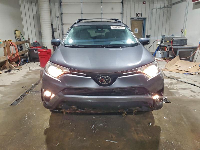 Photo 5 from auction – 2017 TOYOTA RAV4 XLE with VIN 2T3RFREV7HW653883