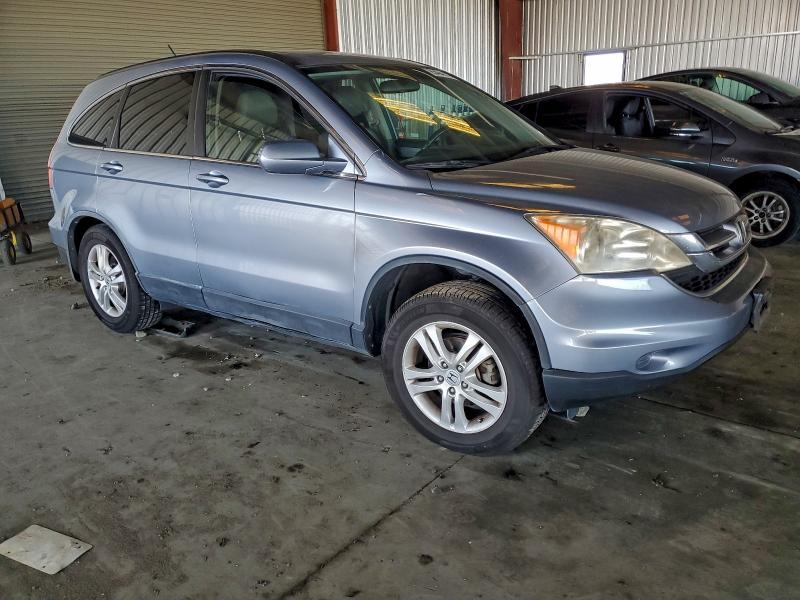 Photo 4 from auction – 2011 HONDA CR-V EXL with VIN JHLRE4H70BC010212