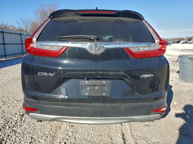 Photo 6 from auction – 2017 HONDA CR-V EXL with VIN 2HKRW2H80HH673090