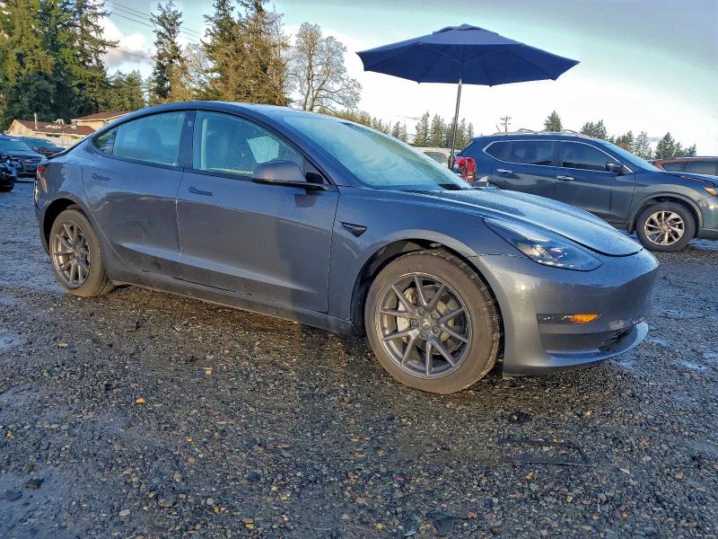 Photo 4 from auction – 2023 TESLA MODEL 3 with VIN 5YJ3E1EA5PF674937