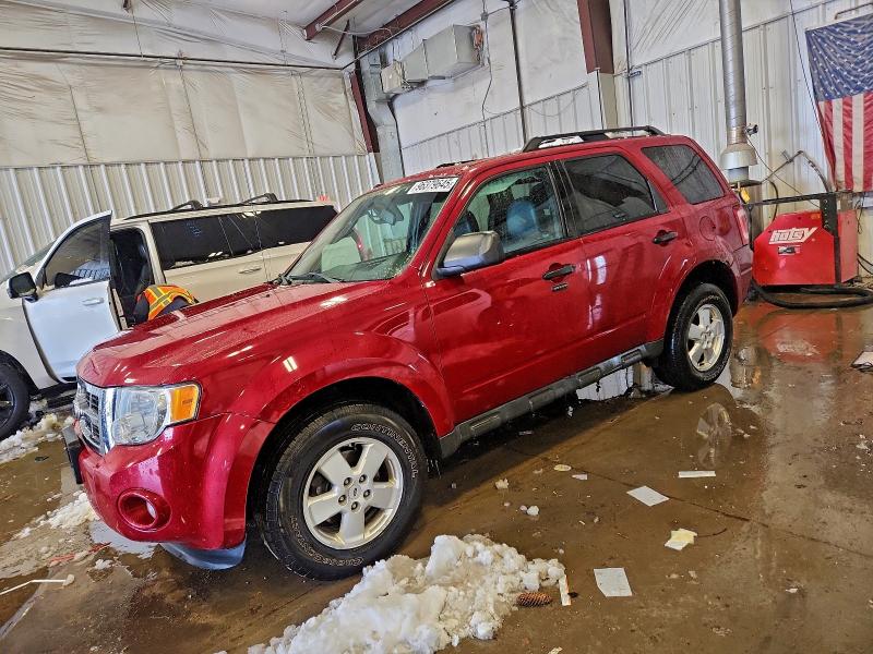 FORD ESCAPE 2011 with VIN 1FMCU0D70BKA97194 - Photo from auction