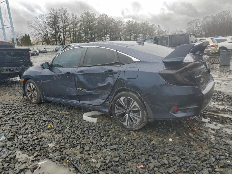 Photo 2 from auction – 2016 HONDA CIVIC with VIN 19XFC1F75GE016482