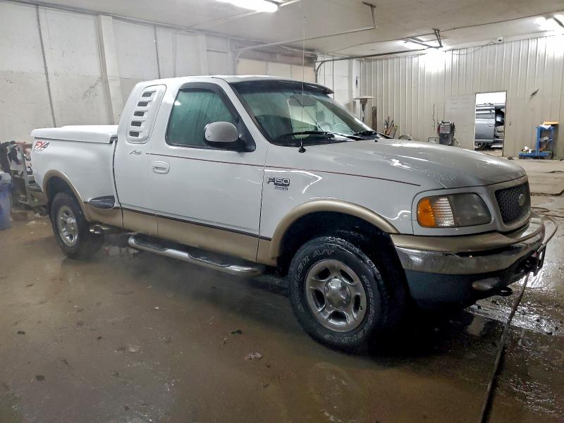 Photo 4 from auction – 1999 FORD F150 with VIN 1FTRX08L1XKB43541