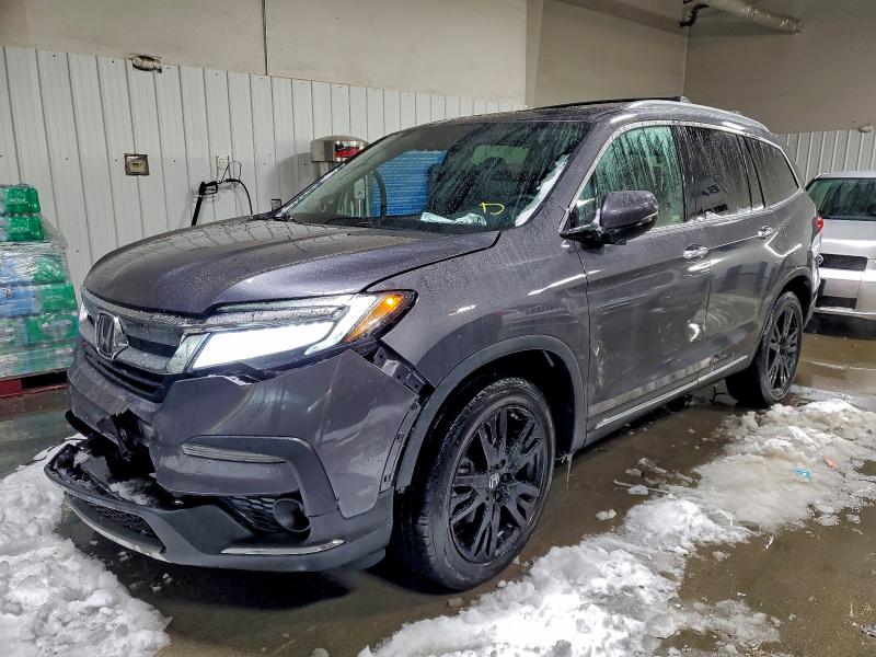 HONDA PILOT TOUR 2019 with VIN 5FNYF6H63KB037609 - Photo from auction