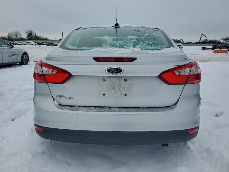 Photo 6 from auction – 2012 FORD FOCUS S with VIN 1FAHP3E22CL384365