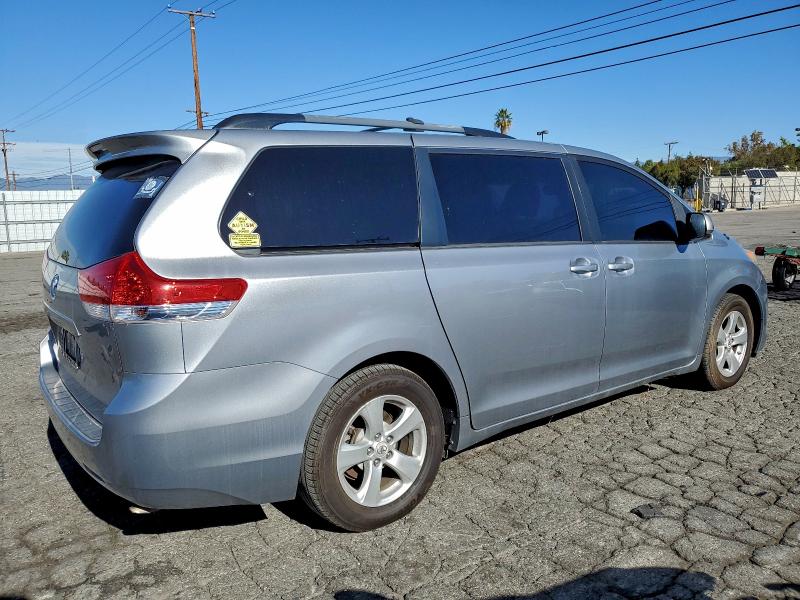 Photo 3 from auction – 2013 TOYOTA SIENNA LE with VIN 5TDKK3DC0DS282734