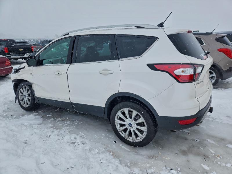 Photo 2 from auction – 2018 FORD ESCAPE TIT with VIN 1FMCU9J90JUA70901