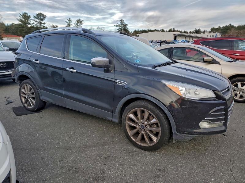 Photo 4 from auction – 2014 FORD ESCAPE with VIN 1FMCU9G96EUC15226