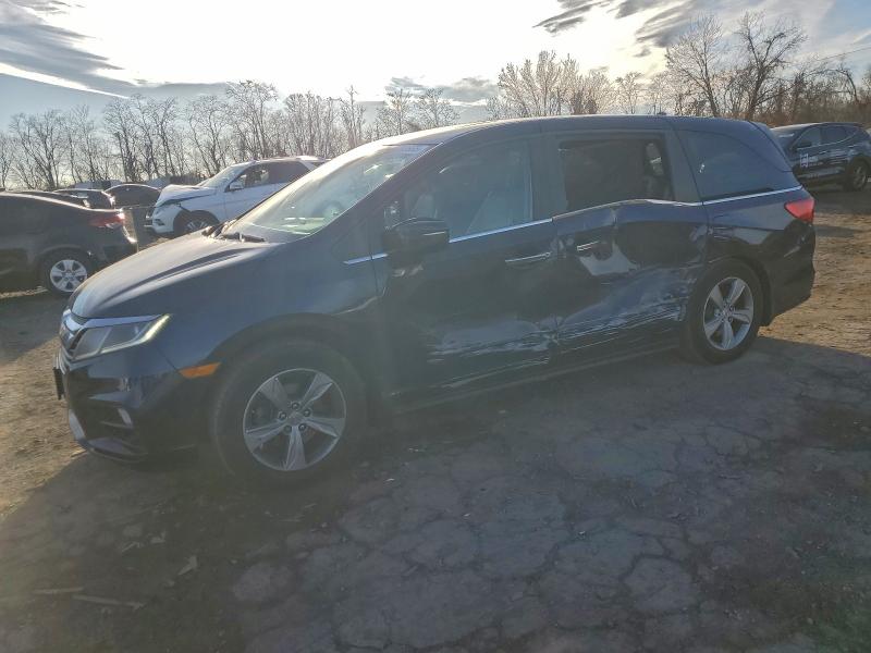 HONDA ODYSSEY 2018 with VIN 5FNRL6H78JB037867 - Photo from auction