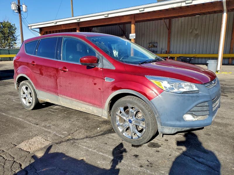 Photo 4 from auction – 2016 FORD ESCAPE SE with VIN 1FMCU9GX0GUA75840