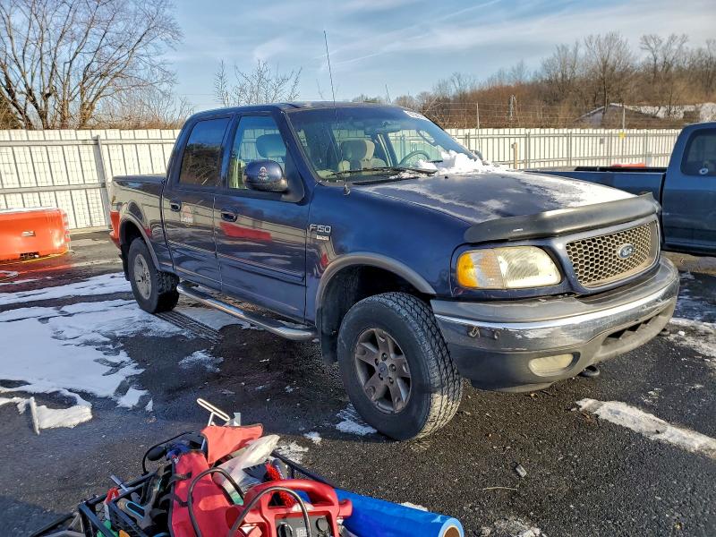 Photo 4 from auction – 2002 FORD F150 SUPER with VIN 1FTRW08L42KE13454