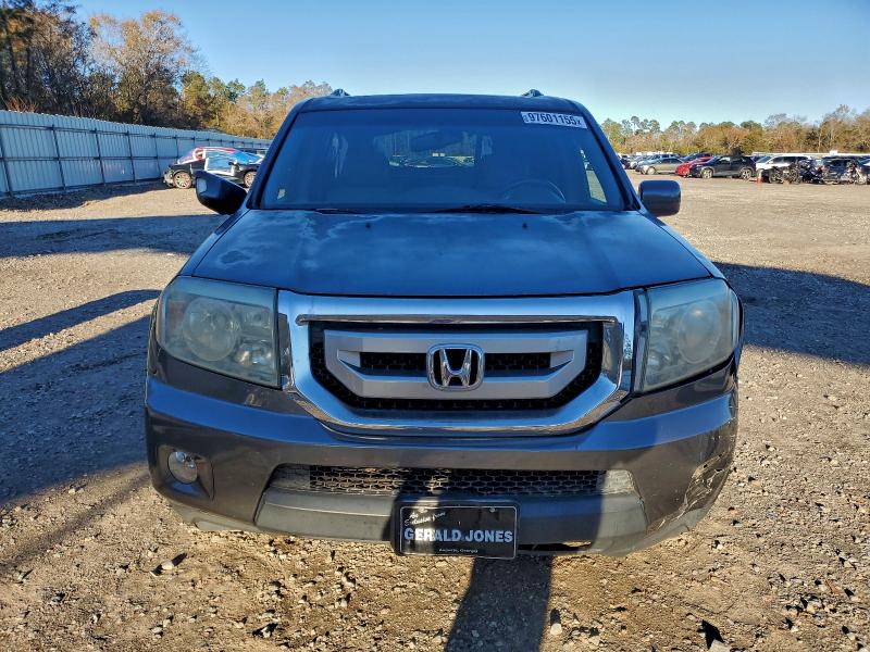 Photo 5 from auction – 2010 HONDA PILOT TOUR with VIN 5FNYF3H95AB015246
